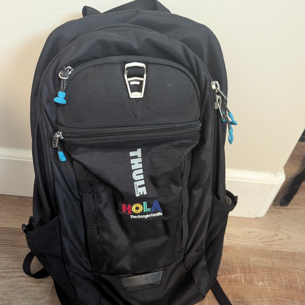 Thule Black Backpack with Vibrant Blue Details